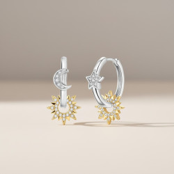 Boucles d'oreilles créoles asymétriques argentées soleil Plaqué or bla