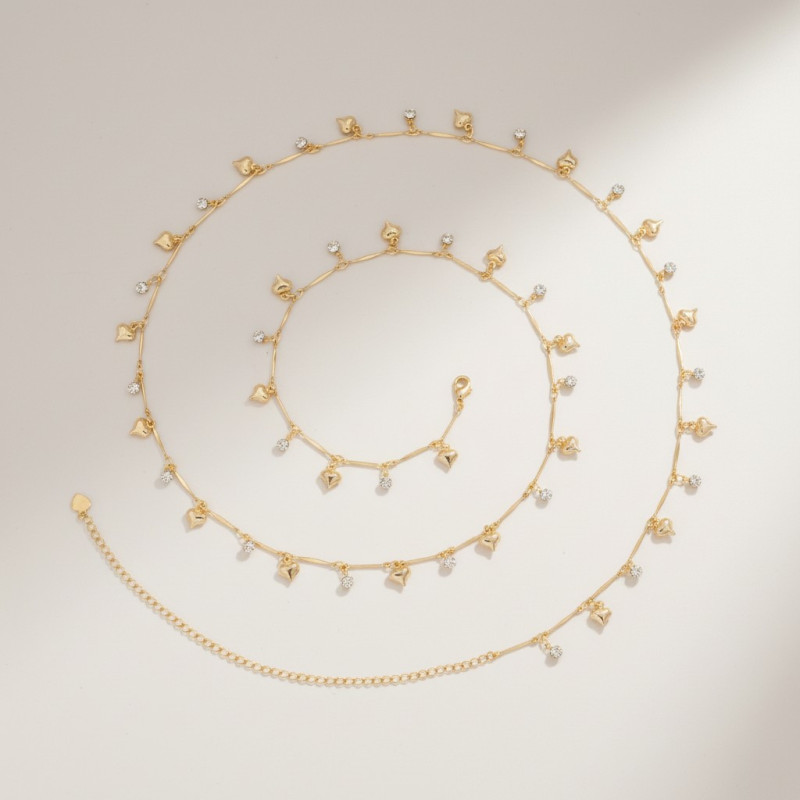 Chaîne de taille dorée coeur et strass
