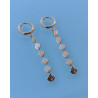 Boucles d'oreilles pendantes dorées coquillages Acier