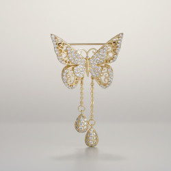 Broche dorée papillon strass et chaînettes