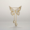Broche dorée papillon strass et chaînettes