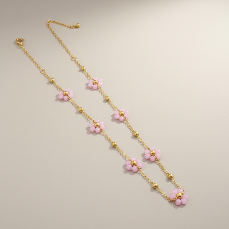 Collier doré fleurs perles roses Acier