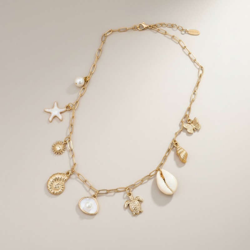 Collier doré charms coquillages et étoile de mer
