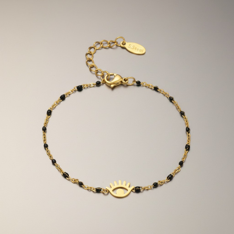 Bracelet doré oeil et perles d'émail noires Acier