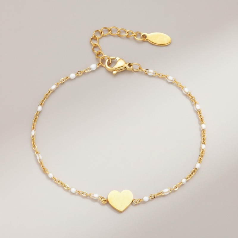 Bracelet doré coeur et perles d'émail blanches Acier
