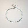 Bracelet argenté croix et perles d'émail bleues ciel Acier