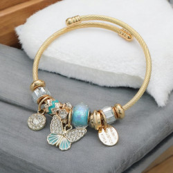 Bracelet doré charms papillon turquoise