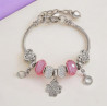 Bracelet argenté charms trèfle rose