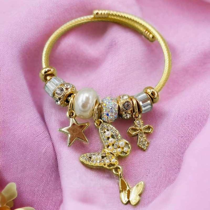 Bracelet charms doré papillon et croix