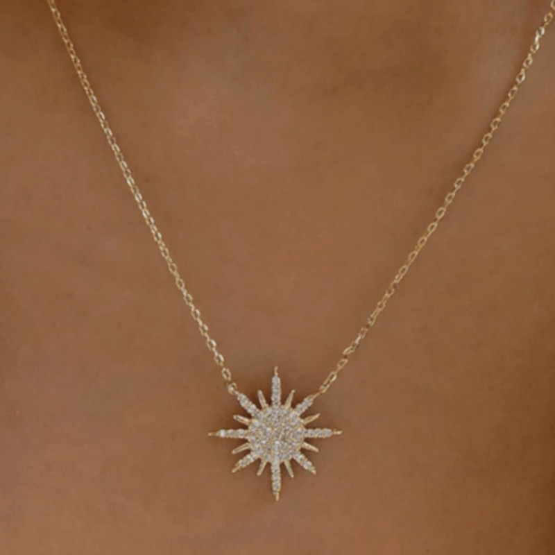 Collier soleil rayonnant strass doré