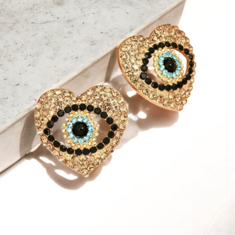 Clous d'oreilles dorés coeur avec mauvais oeil Acier