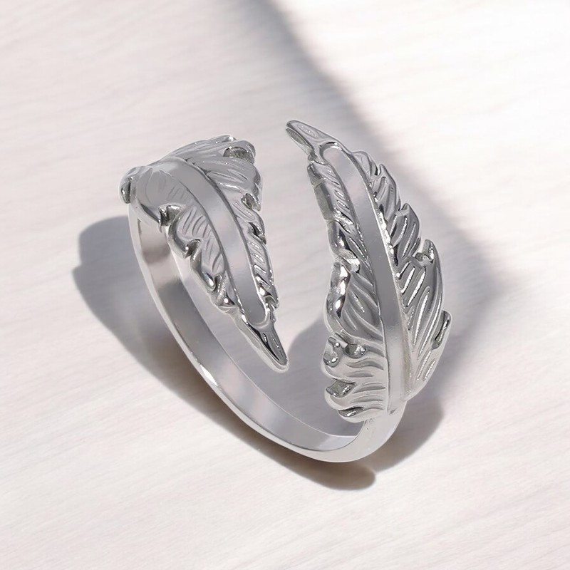 Bague ajustable argentée plume Acier