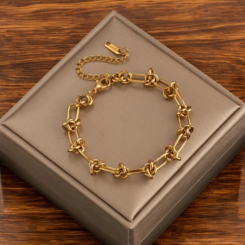 Bracelet doré noué acier